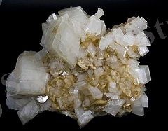 Описание: http://upload.wikimedia.org/wikipedia/commons/thumb/0/09/Dolomite-Magn%C3%A9site-_Navarre.jpg/240px-Dolomite-Magn%C3%A9site-_Navarre.jpg