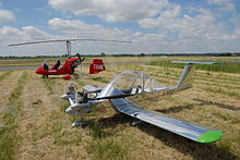 http://upload.wikimedia.org/wikipedia/commons/thumb/7/72/Autogyro_MT03_%26_Colomban_MC-15_%22Cri-Cri%22_-_AirExpo_Muret_2007_0118_2007-05-12.jpg/220px-Autogyro_MT03_%26_Colomban_MC-15_%22Cri-Cri%22_-_AirExpo_Muret_2007_0118_2007-05-12.jpg